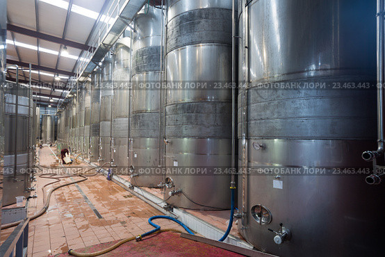 Stainless cisterns with fermenting wine in fabric. Стоковое фото, фотограф Яков Филимонов / Фотобанк Лори