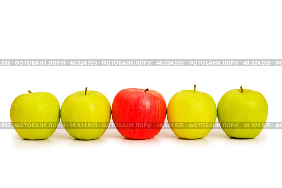 Stand out from crowd concept with apples isolated on white. Стоковое фото, агентство Ingram Publishing / Фотобанк Лори