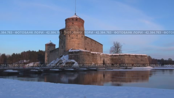 Старинная крепость Олавинлинна мартовским вечером (таймлапс). Савонлина, Финляндия (2018 год). Стоковое видео, видеограф Виктор Карасев / Фотобанк Лори