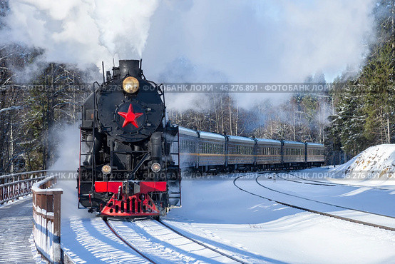 Старый паровоз зимним днем. Республика Карелия, Россия. Стоковое фото, фотограф Анна Карасева / Фотобанк Лори