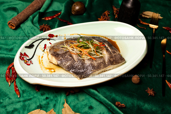 Steamed Flounder Dish With Vegetable Garnish on a Patterned Plate at a Chinese Restaurant. Стоковое фото, фотограф Aleksandr Golubev / Фотобанк Лори