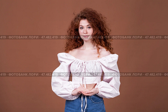 Studio portrait of a red-haired girl. Стоковое фото, фотограф Андрей Аркуша / Фотобанк Лори