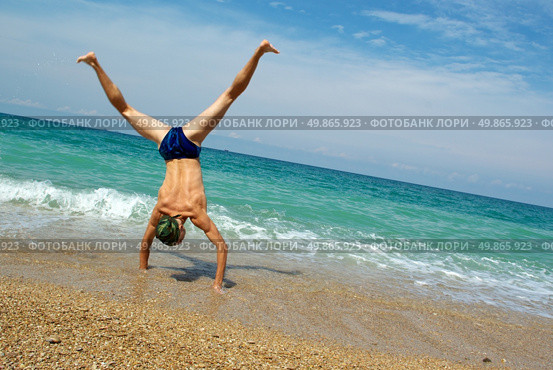 Stunt on beach. Element of design. Стоковое фото, агентство Ingram Publishing / Фотобанк Лори