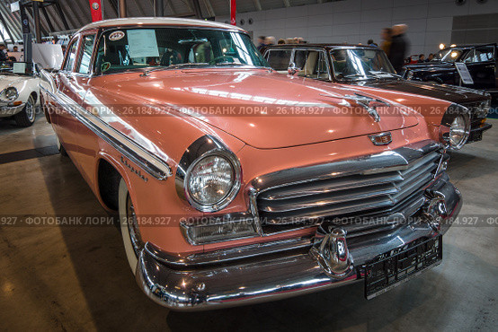 STUTTGART, GERMANY - MARCH 03, 2017: The full-size car Chrysler Windsor, 1956. Europe's greatest classic car exhibition "RETRO CLASSICS" Редакционное фото, фотограф Sergey Kohl / Фотобанк Лори