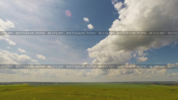 Summer landscape with cloudy sky, view from hill, timelapse, 4k. Стоковое видео, видеограф Михаил Коханчиков / Фотобанк Лори