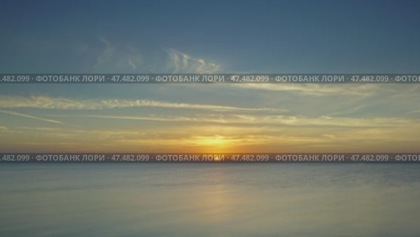 Sunrise over sea, timelapse. Стоковое видео, видеограф Михаил Коханчиков / Фотобанк Лори