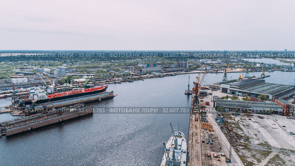 Tanker vessel repair in dry dock Shipyard, Drone shot. Стоковое фото, фотограф Aleksejs Bergmanis / Фотобанк Лори