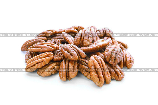 Tasty pecan nuts on white background. Стоковое фото, фотограф Pixel_shot / Фотобанк Лори