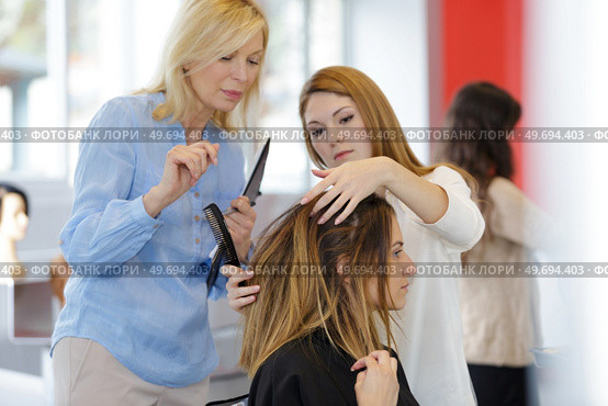 teacher and her trainees. Стоковое фото, агентство Ingram Publishing / Фотобанк Лори