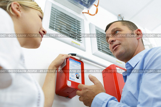 team of coworkers and fire training in office. Стоковое фото, агентство Ingram Publishing / Фотобанк Лори
