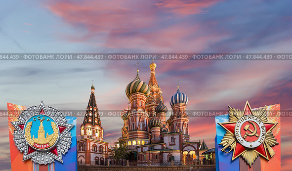 Temple of Basil the Blessed with orders of victory in honor of Victory Day celebration (WWII), Red Square, Moscow, Russia. Against the clouds (2016 год). Стоковое фото, фотограф Владимир Журавлев / Фотобанк Лори
