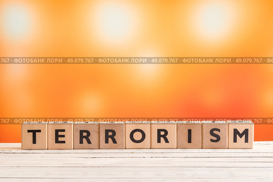 Terrorism headline made of wood on a desk. Стоковое фото, агентство Ingram Publishing / Фотобанк Лори