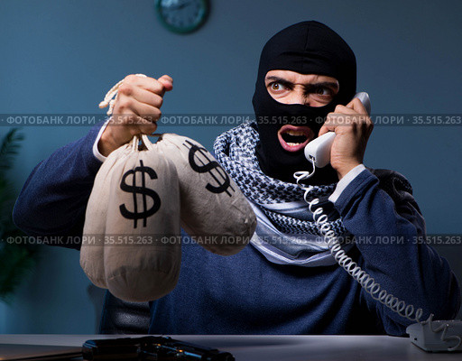 Terrorist asking for money ransom over the phone. Стоковое фото, фотограф Elnur / Фотобанк Лори