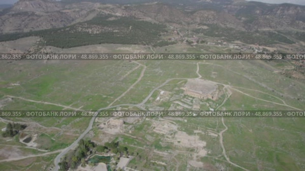 the ancient city of Hierapolis. This is an ancient city near Pamukkale. drone. Стоковое видео, видеограф German Zvyagin / Фотобанк Лори