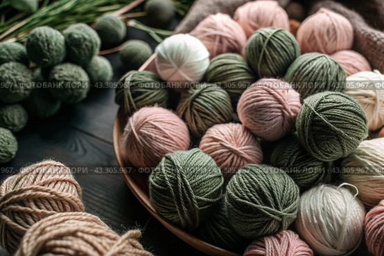 The background is made of balls of wool yarn . Needlework, textiles, knitting. Winter season, small business, handmade clothes. Стоковое AI-изображение, AI-художник Photojuli / Фотобанк Лори