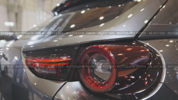 The backlight of a silver color electric car. Стоковое видео, видеограф Константин Шишкин / Фотобанк Лори