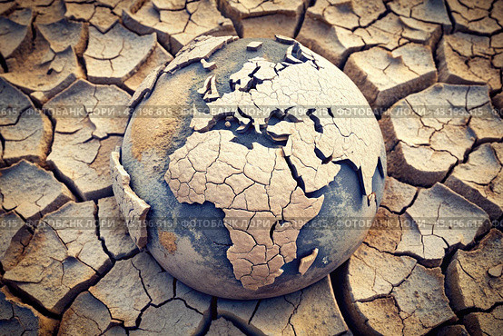 The concept of global warming of the planet earth. Dry and cracked earth, dry due to lack of rain. The effects of climate change. Стоковое AI-изображение, AI-художник Photojuli / Фотобанк Лори