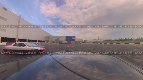 The drift car on the site performs a demonstration race. Shooting with a 360 degree camera. Russia. Moscow. 26.05.24 (2024 год). Редакционное видео, видеограф Ярославский Максим / Фотобанк Лори