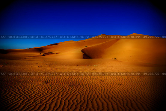 the empty quarter  and outdoor  sand  dune in oman old desert rub   al khali . Стоковое фото, агентство Ingram Publishing / Фотобанк Лори