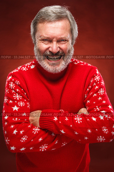 The expressive portrait on red background of a pouter man. Стоковое фото, фотограф Volodymyr Melnyk / PantherMedia / Фотобанк Лори