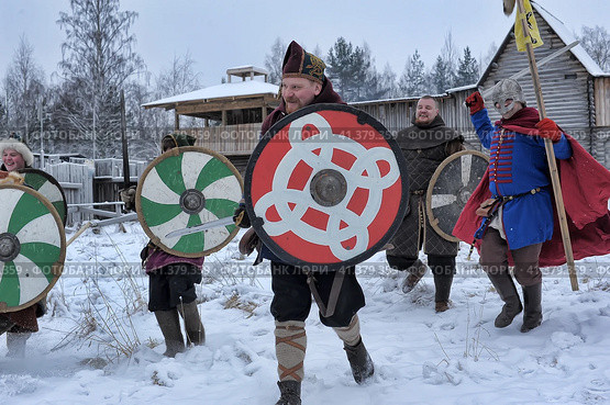 The festival is a historical reconstruction of the Viking Age in winter. Vikings attack with shields and helmets (2014 год). Редакционное фото, фотограф Анна Кривицкая / Фотобанк Лори