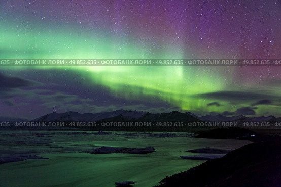 The Northern Light Aurora borealis at Jokulsarlon Glacier Lagoon Iceland. Стоковое фото, агентство Ingram Publishing / Фотобанк Лори