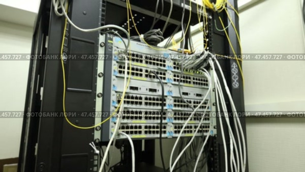 the server cabinet in the computer department of the enterprise is in operation. Стоковое видео, видеограф Алексей Сергеев / Фотобанк Лори