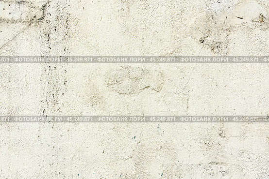 The surface of the old light concrete wall with cracks. Abstract background, texture. Close-up. Стоковое фото, фотограф Лариса Гордеева / Фотобанк Лори