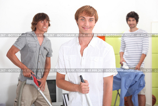 Three lads doing their chores. Стоковое фото, агентство Ingram Publishing / Фотобанк Лори