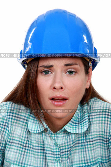 Tired female builder. Стоковое фото, агентство Ingram Publishing / Фотобанк Лори