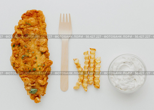 top view fish chips with sauce fork. Стоковое фото, агентство Ingram Publishing / Фотобанк Лори