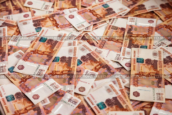 Top view of five thousand russian rubles banknotes, full frame. Background of many scattered banknotes 5000 ruble notes on table, one million cash money. Exchange currency concept. Copy ad text space. Стоковое фото, фотограф Aleksandr Golubev / Фотобанк Лори