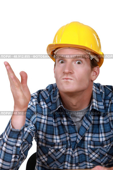 Tradesman looking ready to hit somebody. Стоковое фото, агентство Ingram Publishing / Фотобанк Лори