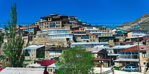 Traditional houses of highlanders on a mountainside in the ancient village of Chokh in Dagestan. Стоковое фото, фотограф Евгений Харитонов / Фотобанк Лори