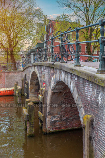 Traditional old buildings in Amsterdam, the Netherlands. Стоковое фото, агентство Ingram Publishing / Фотобанк Лори