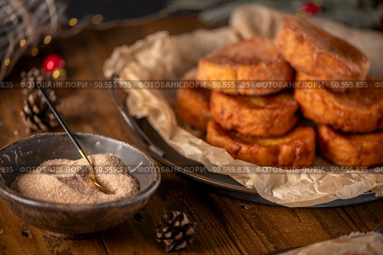 Traditional Portuguese Christmas Rabanadas. Spanish Torrijas on kitchen countertop. Стоковое фото, агентство Ingram Publishing / Фотобанк Лори