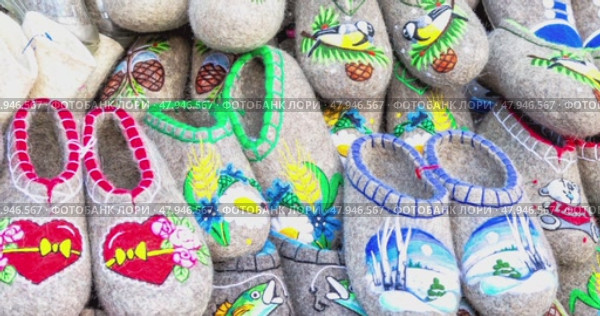 Traditional russian felted boots of different design and patterns. Редакционное видео, видеограф FotograFF / Фотобанк Лори