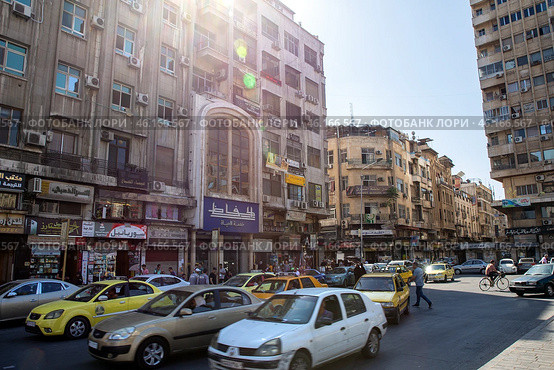 Traffic jams in one of the central squares of Damascus. Republic of Syria. Редакционное фото, фотограф Евгений Ткачёв / Фотобанк Лори