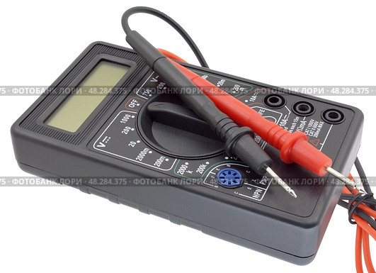 Цифровой мультиметр на белом фоне. Digital  multimeter on a white background. Стоковое фото, фотограф Татьяна Д / Фотобанк Лори
