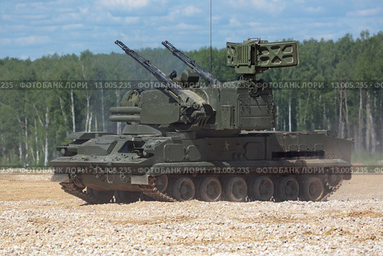 "Тунгуска" (SA-19 Grison) - российский зенитный пушечно-ракетный комплекс на Международном военно-техническом форуме "Армия-2015" на полигоне "Алабино" в Московской области. Редакционное фото, фотограф Игорь Долгов / Фотобанк Лори