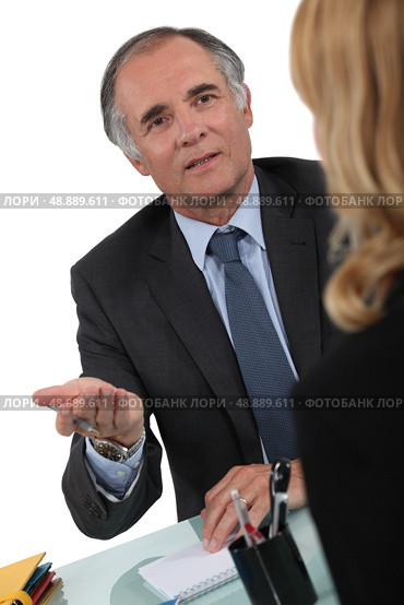 Two businesspeople having discussion. Стоковое фото, агентство Ingram Publishing / Фотобанк Лори
