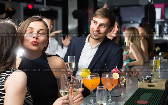 Two female colleagues are exchanging compliments to each other. Стоковое фото, фотограф Яков Филимонов / Фотобанк Лори