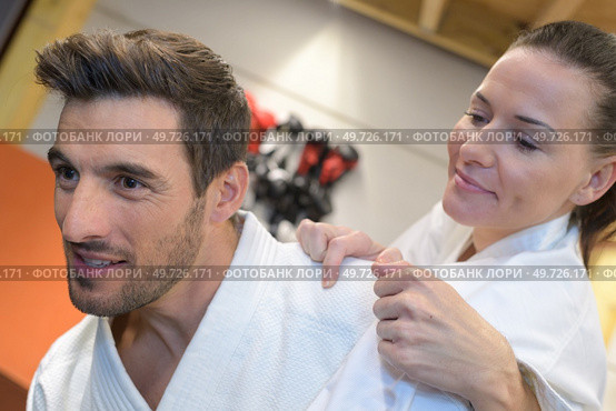 two martial arts fighters practicing indoors. Стоковое фото, агентство Ingram Publishing / Фотобанк Лори