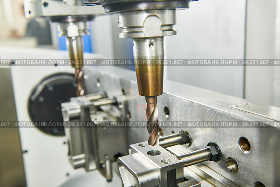 two spindel CNC milling machine at simultaneous metal working. Стоковое фото, фотограф Дмитрий Калиновский / Фотобанк Лори