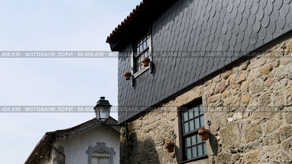 Typical facade an old house in the neighborhood of Ponte de Lima, Portugal. Стоковое фото, агентство Ingram Publishing / Фотобанк Лори