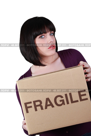 Unhappy woman on moving day. Стоковое фото, агентство Ingram Publishing / Фотобанк Лори