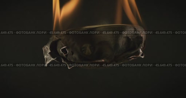 USA dollar bill money is burning in the fire, the concept of the economic crisis of inflation and currency devaluation. Стоковое видео, видеограф Андрей Армягов / Фотобанк Лори