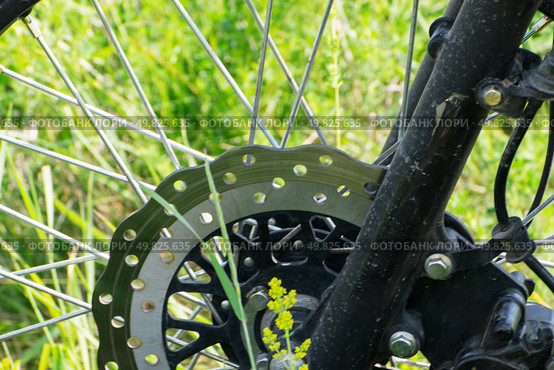 Ventilated brake disc extreme off-road sport enduro motorcycle. Стоковое фото, фотограф Антон Вахрушев / Фотобанк Лори