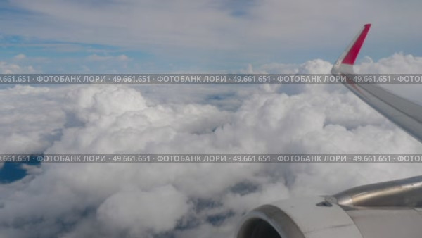 View from porthole on sky with clouds. Стоковое видео, видеограф Игорь Жоров / Фотобанк Лори