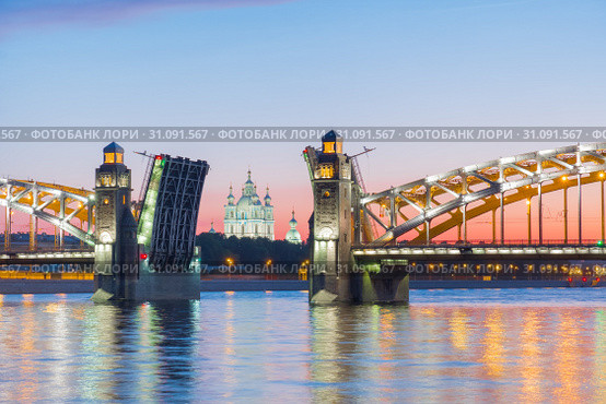 View of the Smolny Cathedral and the divorced Bolsheokhtinsky bridge during the white nights. St. Petersburg. Russia. Стоковое фото, фотограф Ольга Визави / Фотобанк Лори